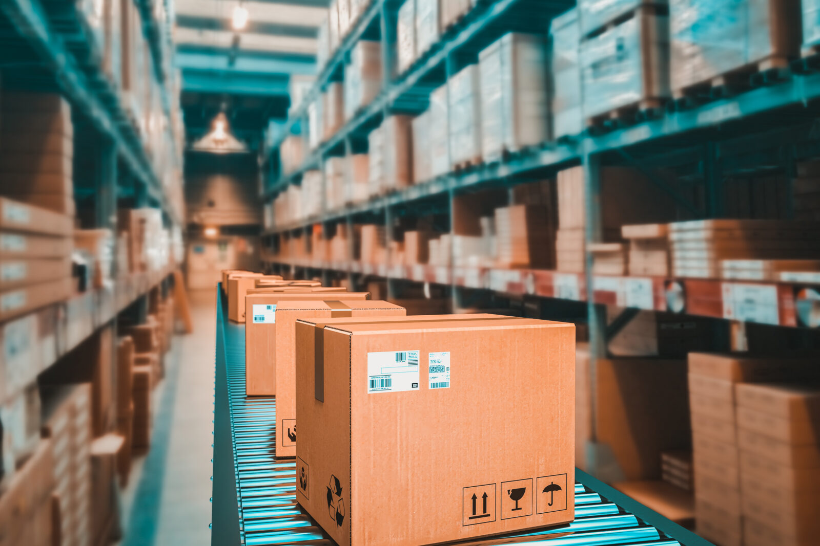 Parcels on conveyer belt in warehouse